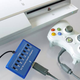 Illustration for article titled Cross Battle Adapter Brings Xbox 360 Controller to PS3, With Rumble